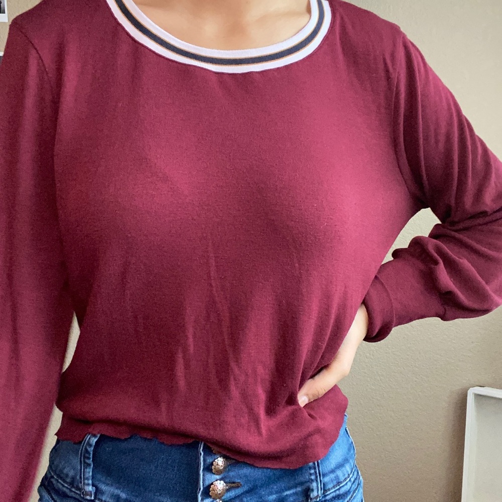 Red long-sleeve top